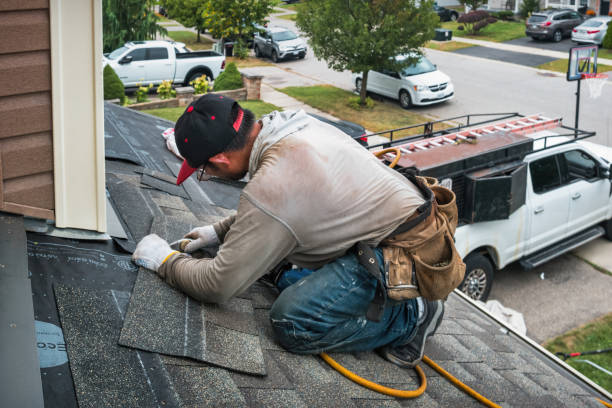 Professional Roofing technician working in Enfield Center, NH